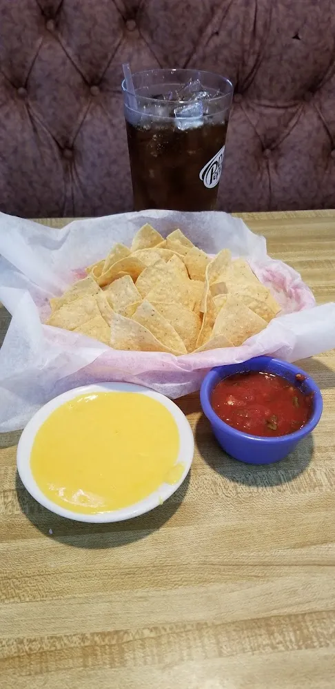 Chips Salsa Queso and a Coke